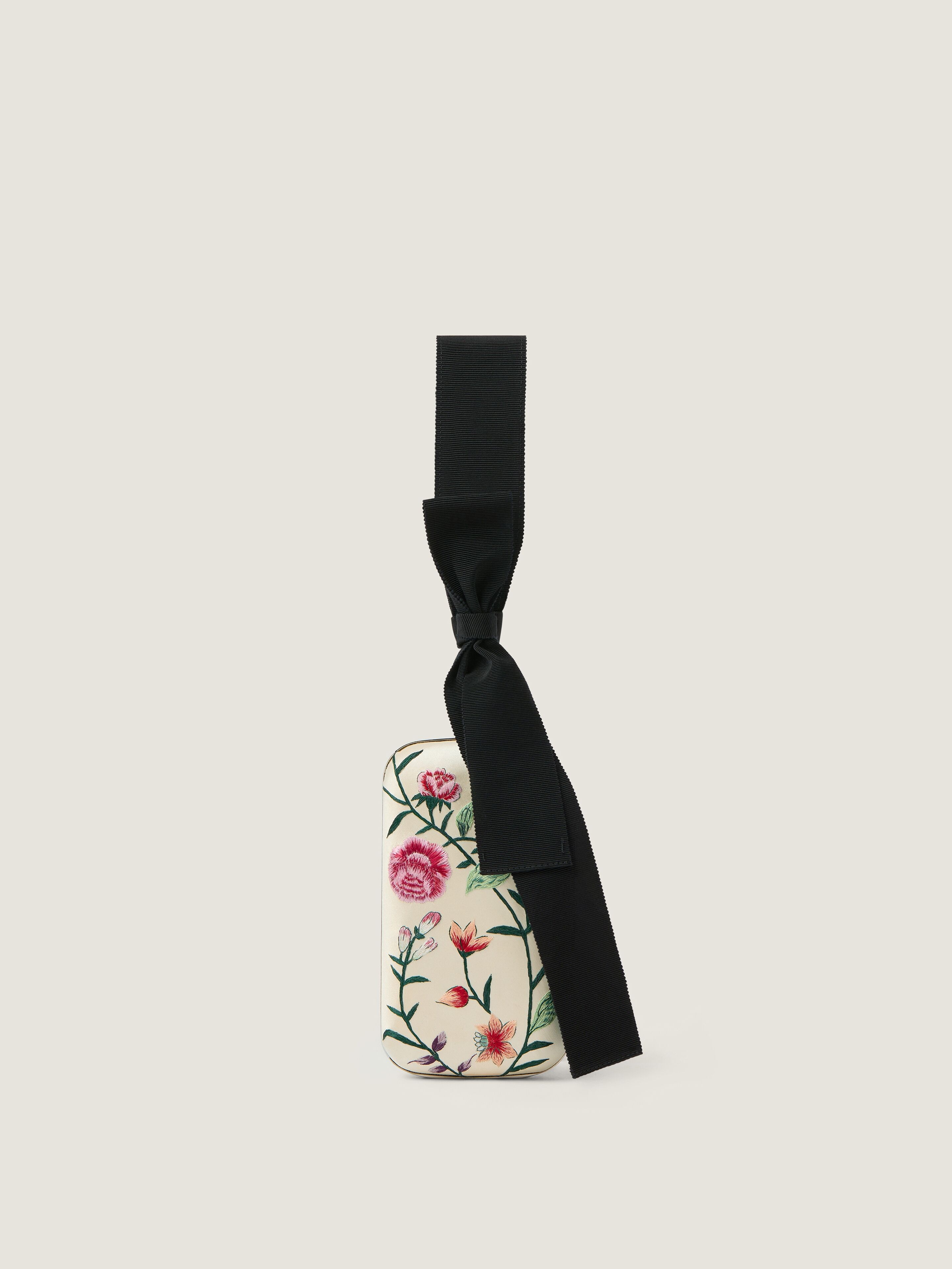 Evening clutch with floral embroideries and bow